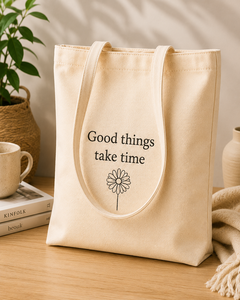 Bolsa de Tela de Algodón con Estampado de Margaritas, Color Beige, para Uso Diario, con la Frase 'Good Things Take Time' - Product Image 1