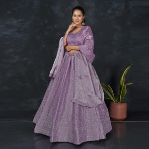 Ensemble Lehenga Choli de créateur avec dupatta, broderie lourde et travail de sequins, idéal pour les fêtes et les mariages - Product Image 1