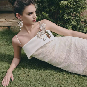 เดรสลูกไม้ลายดอกยาวพรีเมียม OEM ODM สีขาวงาช้าง สไตล์หรูหรา สำหรับสาวสวยวัยรุ่น ไปเที่ยวพักผ่อน - Product Image 1