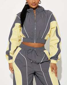 ชุดเซ็ต 2 ชิ้น เสื้อแจ็คเก็ตกันลมคุณภาพสูงสำหรับผู้หญิง ดีไซน์สวยงาม เหมาะสำหรับฤดูหนาว รับสกรีนโลโก้และสีตัดกัน ชุดวอร์มแบบ OEM - Product Image 2