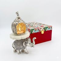 Porte-bougie en forme d'éléphant avec plateau en marbre et boîte