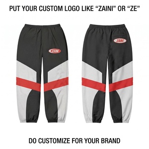 Pantalon coupe-vent réversible en coton 100% léger de qualité supérieure, style jogger, coloris noir, blanc, rouge, avec empiècements colorblock - Product Image 1