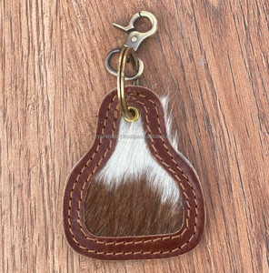 Nuevo diseño Venta caliente pelo en cuero de vaca llavero llaveros de cuero llaveros elegantes forma única llaveros de lujo de cuero - Product Image 3