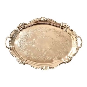 Oval Rose Gold Decorative Tray With Engraved Floral Pattern Traditional Design Single Piece Handle Metal Handicraft - Product Image 1