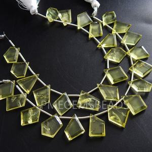 Juego facetado de Briolette de cuarzo limón de 14 piezas, piedra amarilla de 15-10MM de largo, piedra natural 100% certificada por terceros - Product Image 1