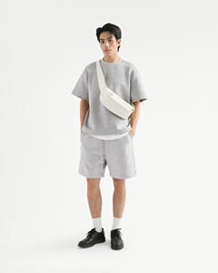 Camiseta de punto lisa de manga corta para hombre con ribete acanalado, colores sólidos, corte holgado, logotipo frontal, ecológica, Vietnam - Product Image 3