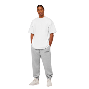 Pantalon de survêtement personnalisé pour homme avec petit logo, coupe décontractée, taille à cordon de serrage, bas de pantalon à revers – Fournisseur en gros OEM pour usines de vêtements - Product Image 1