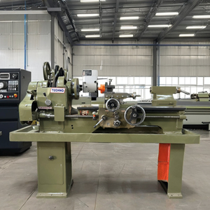 Torno de trabajo ligero con polea cónica, longitud de bancada de 4.6 pies, altura entre centros de 6.5 pulgadas, diámetro del orificio de 1.5 pulgadas, junto con caja de engranajes Norton - Product Image 1