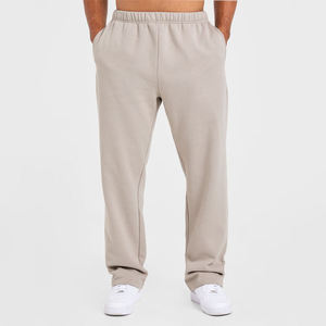 Pantalon de survêtement beige pour homme à taille élastique avec poches latérales, en coton tricoté décontracté, idéal pour l'automne - Product Image 1