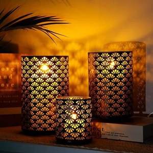 Portavelas votivas de metal únicos, cuidadosamente elaborados para realzar la decoración con luz cálida y un atractivo artesanal. - Product Image 5