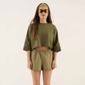 เสื้อยืดผู้หญิงขายส่ง เสื้อยืดคอกลมสีพื้น สำหรับฤดูร้อน ขายส่ง เสื้อครอปผู้หญิงดีไซน์ไม่ซ้ำใคร - Product Image 1