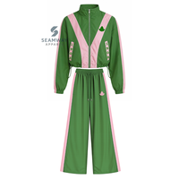 Alpha |   Kapa |   Ensemble coupe-vent en nylon color block Alpha pour femme – Veste zippée vert et rose et pantalon de jogging large – Tenue de sport