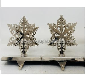 Snowflake <b>stocking</b> metal" primarily refers to decorative metal <b>stocking</b> <b>holders</b> featuring a snowflake design - Product Image 4