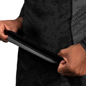 เสื้อรัดรูปป้องกันผื่นคันแขนยาวพร้อมโลโก้ที่กำหนดเองเสื้อบีบอัดกันรังสียูวีสำหรับการฝึกออกกำลังกาย MMA BJJ ตัวเลือกการออกแบบที่กำหนดเอง - Product Image 5