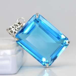Pendentif en topaze bleue naturelle 110,30 carats, taille émeraude, pierre précieuse en argent sterling 925, certifié IGI, collier de style ethnique, vertus curatives - Product Image 2