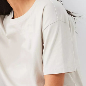 เสื้อยืดโอเวอร์ไซส์ผ้าฝ้ายคอกลมทรงหลวมพิมพ์ลายโลโก้เรียบง่ายระบายอากาศได้ดีใส่ได้ทุกฤดูสำหรับผู้หญิง ปี 2026 - Product Image 5