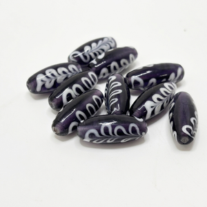Hand crafted purple <b>glass</b> feather pattern trade beads with artisan <b>charm</b> ideal for jewelry making fashion crafts and decor - Product Image 1