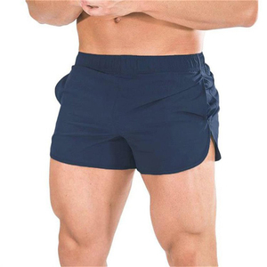 Shorts de sport gris uni coupe-vent à séchage rapide pour homme avec poches, taille élastique, longueur mi-cuisse, en toile de coton - Product Image 3