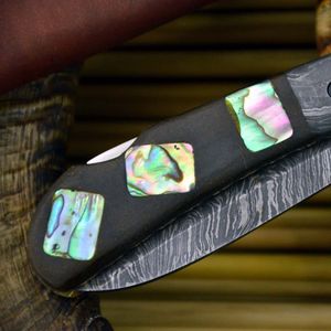 Cuchillo de caza de acero de Damasco con hoja de punta caída, borde serrado, mango de micarta e incrustaciones de marfil - Product Image 4