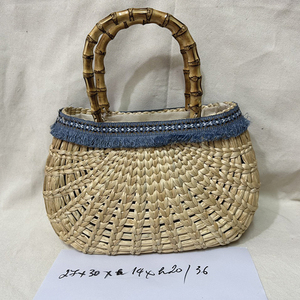 Été 2023 Nouveau design Hollow Out Rattan Straw Bag High-class Female Beach Basket Bag - Product Image 1