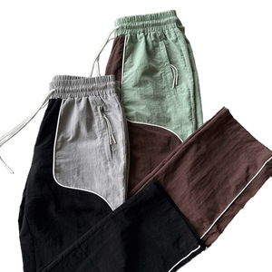 Crinkle Fabric Panel <b>Baggy</b> Trousers Men Loose Fit Streetwear Pants Textured Panel <b>Jogger</b> Pants Oversized Fashion Trousers Unisex - Product Image 2