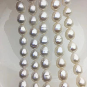 Perles de riz blanc d'eau douce 10-11mm en vrac pour la fabrication de bijoux, vente en gros, surface lisse - Product Image 1