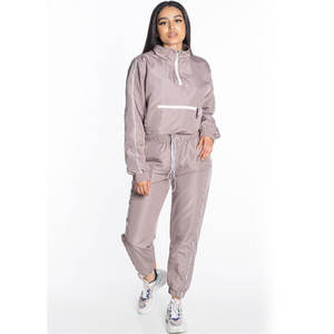 Ensemble de survêtement coupe-vent unisexe personnalisé pour l'été, style hip-hop, OEM, léger, respirant, pour l'extérieur, logo personnalisé INNOVEARS - Product Image 1