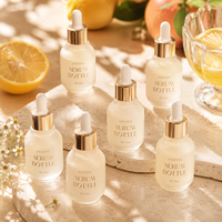 Flacon en verre premium de 30 ml pour huiles essentielles : Récipient haute transparence pour soins du visage et sérums, vente en gros OBM