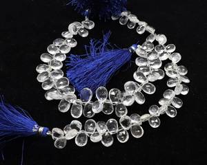 ลูกปัดคริสตัลควอตซ์ธรรมชาติทรงลูกแพร์ AAA ขนาด 7x10 มม. ลูกปัดคริสตัลควอตซ์ทรงลูกแพร์เจียระไนสำหรับทำเครื่องประดับ - Product Image 1