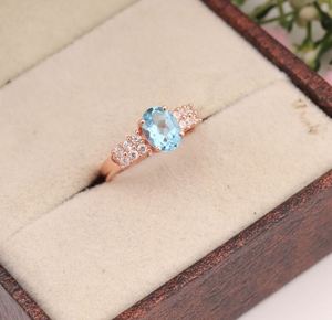 Anillo de Compromiso de Lujo para Mujer con Topacio Azul Natural, Corte Ovalado, Chapado en Oro de 14k, Plata de Ley, Engaste de Garras - Product Image 4