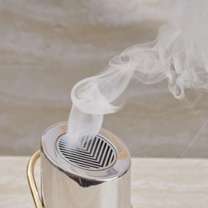 Sleek Silver-Tone Cylindrical Incense <b>Burner</b> Featuring Angled Top Grate Gold-Tone <b>Side</b> Handle Loop Rising Smoke For Aromatherapy - Product Image 2