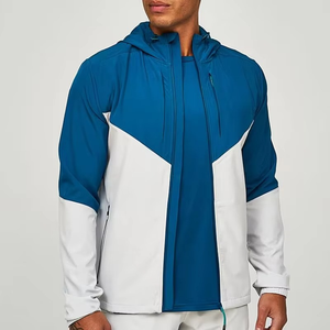 Veste de sport coupe-vent à capuche bleue et blanche pour homme, manches longues, blocs de couleur, fermeture éclair, poches latérales, légère, coupe classique - Product Image 1