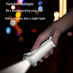 พัดลมพกพา 3-in-1 ขนาดเล็ก สีสุ่ม ใช้พอร์ต USB ชาร์จได้ มีไฟฉายอเนกประสงค์ พับเก็บได้ และสวมใส่ได้ 'Treasure' - Product Image 3