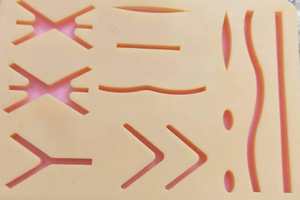 Coussin de suture pour étudiants en médecine - Coussin d'entraînement réutilisable en silicone durable à 3 couches avec plaies pré-découpées pour usage hospitalier - Product Image 6