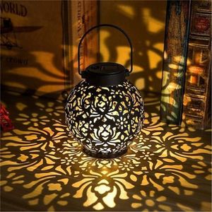Vintage Metal Solar Lantern Decorative Hanging Garden Light Waterproof Moroccan Hollow Pattern Projection Lamp For <b>Table</b> Walkway - Product Image 1