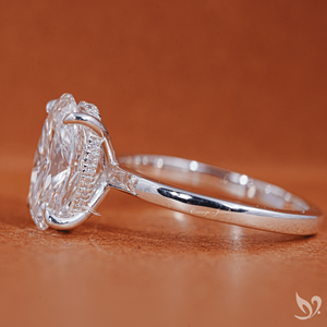 แหวนเพชรทรงรี 3 กะรัต ผลิตในห้องปฏิบัติการ ได้รับการรับรองจาก IGI |   แหวนทองคำแท้ 10k ประดับเพชรเม็ดเดี่ยวทรงกลม พร้อมวงแหวนรอบนอกแบบซ่อน ได้รับการรับรองจาก IGI - Product Image 2