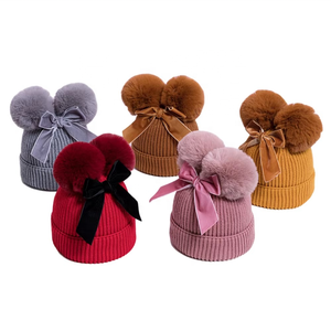 Gorro de Invierno Cálido para Bebés y Niños Pequeños, Forrado de Algodón, con Lazo de Terciopelo, Gorro de Lana Tejida con Doble Pompón - Product Image 1