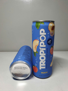 Refresco de melocotón marca TropiPop, lata de 330 ml con vitaminas A, B y C, elaborado con fruta fresca. - Product Image 1