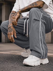 Pantalones anchos holgados para hombre con pliegues en la rodilla, cintura elástica, de secado rápido, tipo paracaídas, OEM, personalizados, al por mayor - Product Image 2