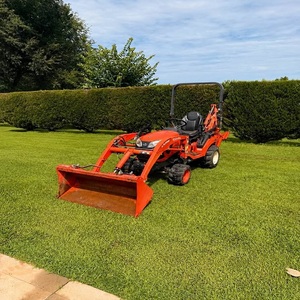 Tracteur Kubota BX23S HST avec chargeur et pelle rétrocaveuse, moteur diesel trois cylindres 21,6 CV, transmission 4x4 et flexible - Product Image 1