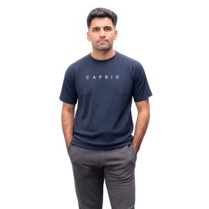 เสื้อยืดแขนสั้นสีน้ำเงินเข้มสำหรับผู้ชาย ยี่ห้อ Caprio ทรงปกติ คอกลม ระบายอากาศได้ดี ผ้าถัก สวมใส่สบาย ผลิตจากผ้าฝ้าย 100% แห้งเร็ว - Product Image 1