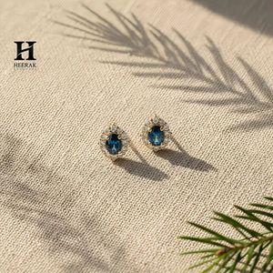Oval Blue Sapphire Halo <b>Stud</b> <b>Earrings</b> – 14k Gold with Certified Diamonds – <b>Fine</b> Jewelry Manufacturer by Heerak Diamonds - Product Image 1