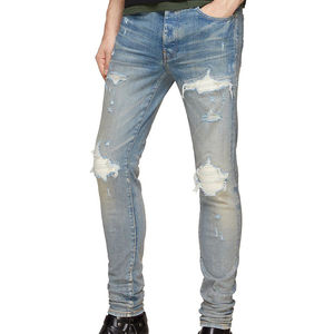 Jean en denim bleu déchiré et vieilli pour homme, taille mi-haute, fermeture boutonnée, style décontracté, 100 % coton tissé, coupe droite, collection printemps - Product Image 1