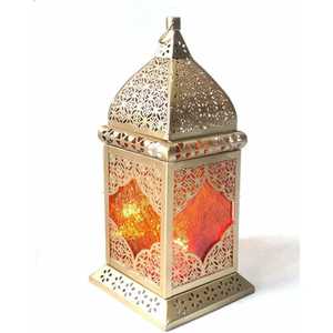 Tall cylindrical metal lantern trio ornate cutout patterns dome shaped <b>top</b> warm glowing light elegant craftsmanship indoor - Product Image 4