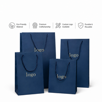 Sacs cadeaux en papier d'art de luxe imprimés sur mesure avec poignée en corde de coton, recyclables et réutilisables pour l'emballage de vêtements et de chaussures, couleur personnalisée