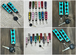 Nouveau porte-clés en cuir véritable à carreaux, bracelet de poignet bohème, porte-clés de voiture en cuir de vachette gravé, clip de fixation pour clés - Product Image 3