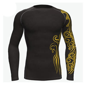 Premium Quality <b>Long</b> <b>Sleeve</b> MMA Heat-Transfer Printed Breathable Eco-Friendly Rash Guard <b>Black</b> Golden Color Multi-Functional - Product Image 1