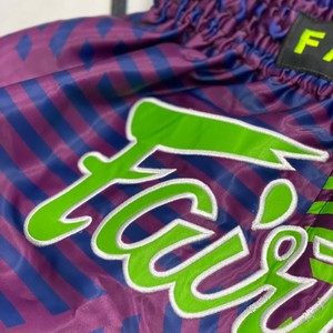 Pantalones Cortos de Muay Thai Fairtex de Último Diseño en Naranja y Negro con Logotipo Bordado y Estampado por Sublimación - Product Image 4