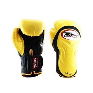 Gants de boxe de haute qualité pour l'entraînement et le sparring, matériau durable, sangle de poignet sécurisée, ajustement confortable pour hommes et femmes, idéal pour la gym et le fitness. - Product Image 1