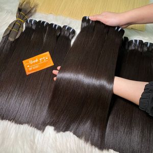 ผมต่อเวียดนามแท้สีดำตรงธรรมชาติ  แบบ Remy  ความยาว 14-16 นิ้ว  แบบถักด้วยเครื่องจักร  เนื้อผมสองชั้น  มีทุกสี  พร้อมส่ง - Product Image 4